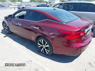2016 Nissan Maxima SL with VIN 1N4AA6AP2GC408837, listed as a IAAI auction lot 42006849 with 228,119 mi miles and . Bid and sale history available at DreamBid. Image 3.