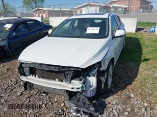 2015 Volvo V60 T5 Drive-E Premier z VIN YV140MEK2F1267396, wystawiony jako IAAI lot #41921329 z przebiegiem 93 937 mil mil oraz . Historia ofert i sprzedaży dostępna na DreamBid. Obrazek 6.
