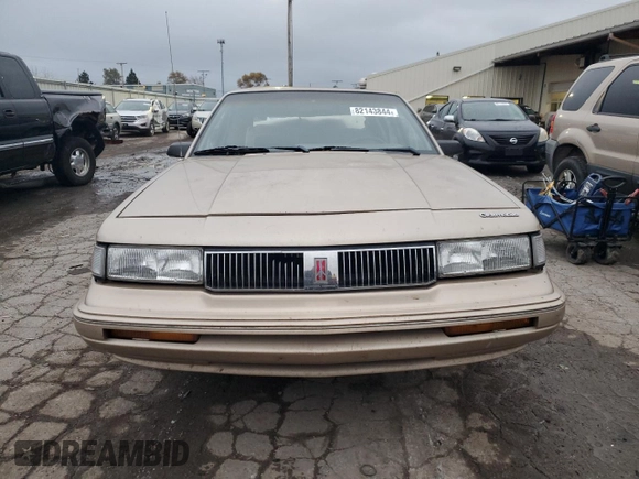 1995 Oldsmobile Cutlass Ciera SL z VIN 1G3AJ55MXS6369507, wystawiony jako Copart lot #82143844 z przebiegiem 95 303 mil mil oraz Szkoda całkowita • Salvage title. Historia ofert i sprzedaży dostępna na DreamBid. Obrazek 5.