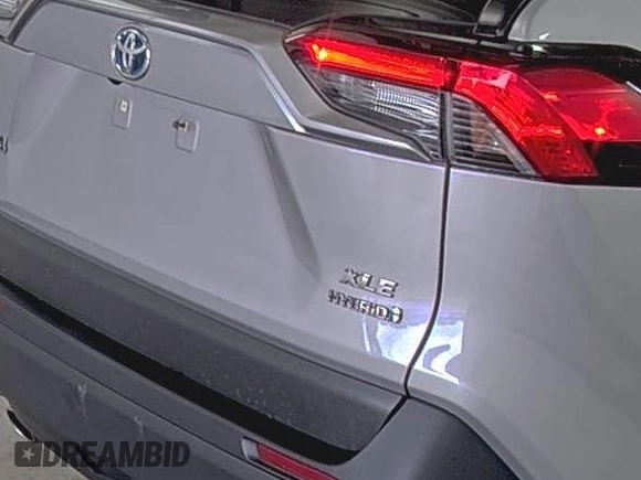 2022 Toyota RAV4 Hybrid XLE Premium with VIN 4T3B6RFV5NU085564, listed as a IAAI auction lot 42854215 with 49,616 mi miles and . Bid and sale history available at DreamBid. Image 14.