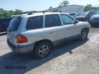 2003 Hyundai Santa Fe GLS with VIN KM8SC73D83U370273, listed as a IAAI auction lot 42577324 with 181,105 mi miles and . Bid and sale history available at DreamBid. Image 4.