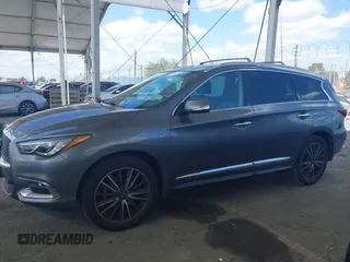 2019 Infiniti QX60 Pure z VIN 5N1DL0MN3KC565998, wystawiony jako IAAI lot #41911130 z przebiegiem 79 463 mil mil oraz . Historia ofert i sprzedaży dostępna na DreamBid. Obrazek 14.