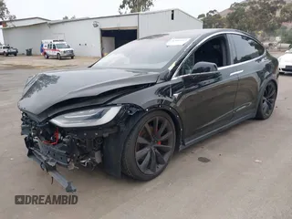 2020 Tesla Model X P90D with VIN 5YJXCDE4XLF296255, listed as a IAAI auction lot 42087953 with 45,411 mi miles. Bid and sale history available at carsss.com. Image 2.