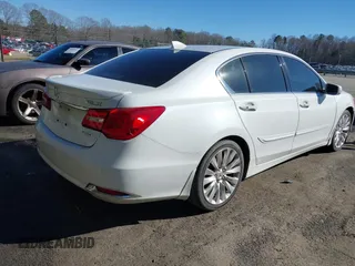 2014 Acura RLX Advance Pkg with VIN JH4KC1F94EC001457, listed as a IAAI auction lot 41642199 with 208,443 mi miles. Bid and sale history available at carsss.com. Image 4.