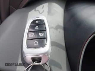 2023 Hyundai Santa Fe SEL with VIN 5NMS24AJ7PH563090, listed as a IAAI auction lot 42218343 with 52,076 mi miles and . Bid and sale history available at DreamBid. Image 11.