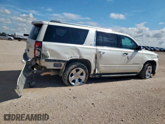 2015 Chevrolet Suburban LTZ with VIN 1GNSCKKC6FR705660, listed as a Copart auction lot 60328685 with 174,247 mi miles and Salvage title. Bid and sale history available at DreamBid. Image 3.