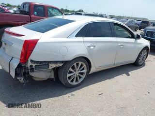2013 Cadillac XTS Premium z VIN 2G61S5S33D9235025, wystawiony jako IAAI lot #42288742 z przebiegiem 180 221 mil mil oraz . Historia ofert i sprzedaży dostępna na DreamBid. Obrazek 4.