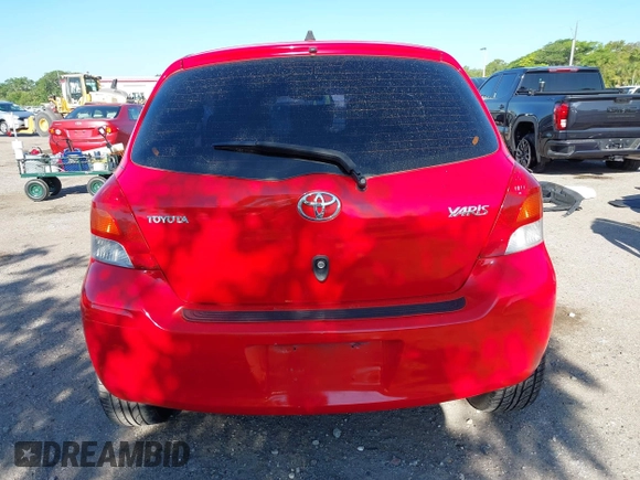 2009 Toyota Yaris with VIN JTDJT903695234623, listed as a IAAI auction lot 42027852 with 146,000 mi miles. Bid and sale history available at carsss.com. Image 16.