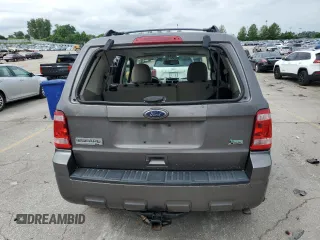 2012 Ford Escape XLT с VIN 1FMCU9DG7CKC03954, выставлен на аукционе Copart как лот 61026785 с пробегом 181 091 миль миль и Списание • Salvage title. История ставок и продаж доступна на DreamBid. Изображение 6.
