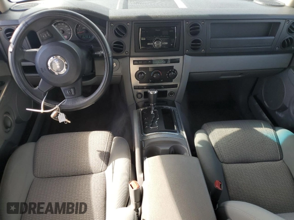 2006 Jeep Commander with VIN 1J8HH48K96C289162, listed as a Copart auction lot 80979074 with 170,581 mi miles and Salvage title. Bid and sale history available at DreamBid. Image 8.
