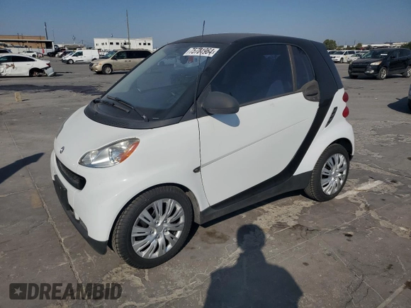 2012 Smart fortwo Pure z VIN WMEEJ3BA5CK540092, wystawiony jako Copart lot #75701964 z przebiegiem 59 355 mil mil oraz Szkody całkowita. Historia ofert i sprzedaży dostępna na DreamBid. Obrazek 1.