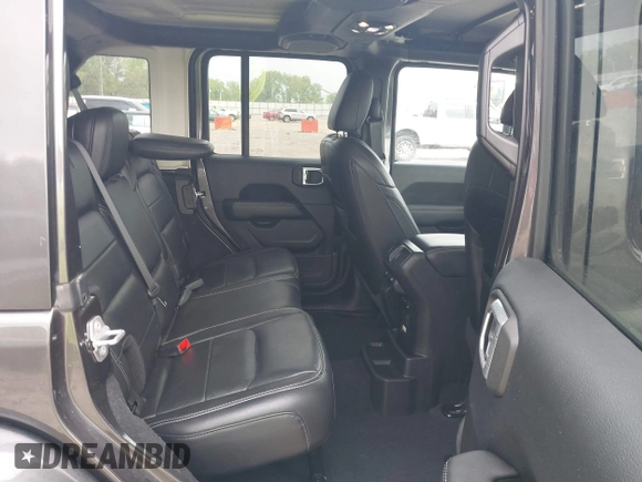 2018 Jeep Wrangler Unlimited Sahara with VIN 1C4HJXEN8JW303023, listed as a IAAI auction lot 42138631 with 72,463 mi miles and . Bid and sale history available at DreamBid. Image 8.