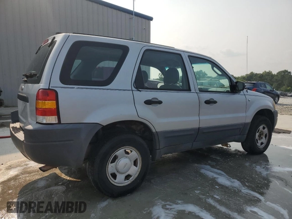 2002 Ford Escape XLS Choice z VIN 1FMYU01102KB13125, wystawiony jako Copart lot #59034495 z przebiegiem 202 253 mil mil oraz Szkoda całkowita • Salvage title. Historia ofert i sprzedaży dostępna na DreamBid. Obrazek 3.