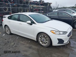 2020 Ford Fusion SE z VIN 3FA6P0HD8LR160330, wystawiony jako IAAI lot #42348552 z przebiegiem 95 610 mil mil oraz . Historia ofert i sprzedaży dostępna na DreamBid. Obrazek 1.