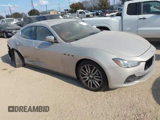 2017 Maserati Ghibli with VIN ZAM57XSAXH1258107, listed as a IAAI auction lot 41499668 with 88,126 mi miles. Bid and sale history available at carsss.com. Image 1.