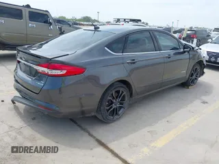 2018 Ford Fusion Hybrid SE with VIN 3FA6P0LU1JR116139, listed as a IAAI auction lot 41933594 with 83,000 mi miles. Bid and sale history available at carsss.com. Image 4.