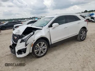 2024 Cadillac XT5 FWD Premium Luxury with VIN 1GYKNCRS9RZ706158, listed as a Copart auction lot 60455055 with 7,999 mi miles and Salvage title. Bid and sale history available at DreamBid. Image 1.
