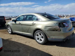2013 Ford Taurus SEL with VIN 1FAHP2H80DG204787, listed as a Copart auction lot 48562035 with 126,003 mi miles and Clean Title. Bid and sale history available at DreamBid. Image 2.