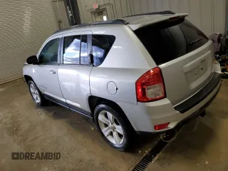 2011 Jeep Compass with VIN 1J4NT1FB0BD245673, listed as a Copart auction lot 82597074 with 207,695 mi miles and Clean Title. Bid and sale history available at carsss.com. Image 2.