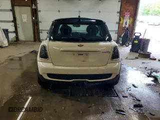 2009 MINI Hardtop S with VIN WMWMF73509TW83066, listed as a Copart auction lot 58603205 with 113,242 mi miles and Salvage title. Bid and sale history available at DreamBid. Image 6.