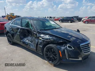 2018 Cadillac CTS RWD z VIN 1G6AP5SXXJ0180048, wystawiony jako IAAI lot #41884895 z przebiegiem 82 383 mil mil oraz . Historia ofert i sprzedaży dostępna na DreamBid. Obrazek 1.