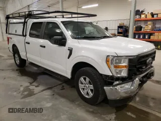2021 Ford F-150 XL with VIN 1FTFW1E8XMKE65151, listed as a Copart auction lot 52579095 with 77,927 mi miles and Salvage Title. Bid and sale history available at carsss.com. Image 4.