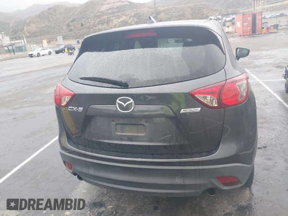 2016 Mazda CX-5 Touring with VIN JM3KE2CY7G0630056, listed as a IAAI auction lot 41817525 with 97,844 mi miles and . Bid and sale history available at DreamBid. Image 16.