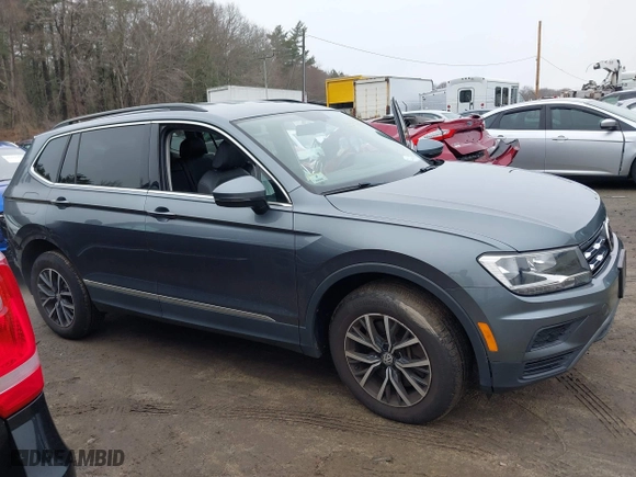 2020 Volkswagen Tiguan SE with VIN 3VV2B7AX2LM086678, listed as a IAAI auction lot 41694051 with 59,495 mi miles. Bid and sale history available at carsss.com. Image 14.