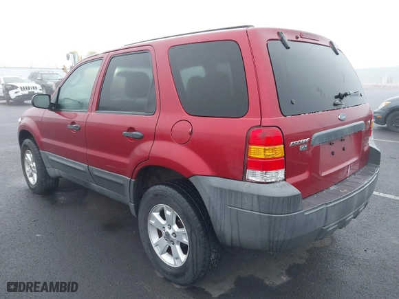 2007 Ford Escape XLT with VIN 1FMCU03147KC00069, listed as a IAAI auction lot 41343434 with 209,220 mi miles. Bid and sale history available at carsss.com. Image 3.