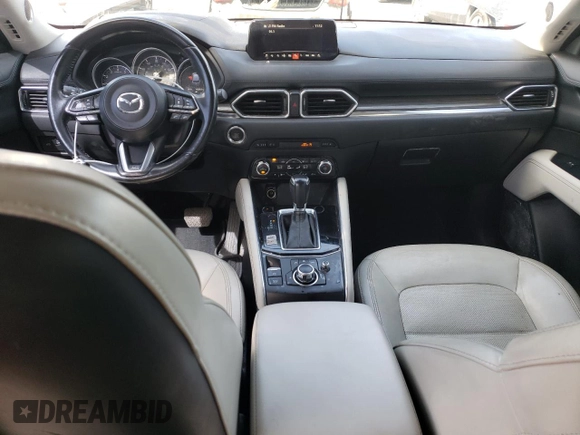 2018 Mazda CX-5 Grand Touring z VIN JM3KFBDM4J0300519, wystawiony jako Copart lot #51548745 z przebiegiem 102 853 mil mil oraz Szkoda całkowita • Salvage title. Historia ofert i sprzedaży dostępna na DreamBid. Obrazek 8.