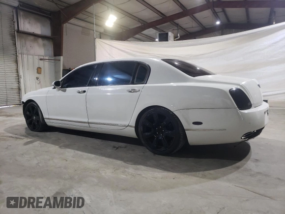 2007 Bentley Flying Spur with VIN SCBBR93W97C040186, listed as a Copart auction lot 84065224 with Not Provided miles and Salvage Title. Bid and sale history available at DreamBid. Image 2.