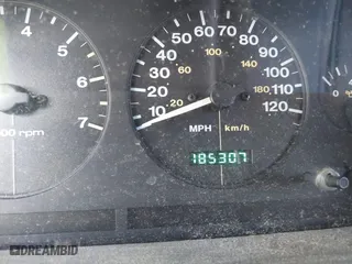 1997 Jeep Grand Cherokee Laredo with VIN 1J4GZ58S0VC550242, listed as a IAAI auction lot 41032114 with 185,307 mi miles. Bid and sale history available at carsss.com. Image 7.