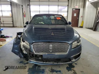 2018 Lincoln MKZ Premiere z VIN 3LN6L5A9XJR608584, wystawiony jako Copart lot #57723935 z przebiegiem Nie podano mil oraz Szkoda całkowita • Salvage title. Historia ofert i sprzedaży dostępna na DreamBid. Obrazek 5.