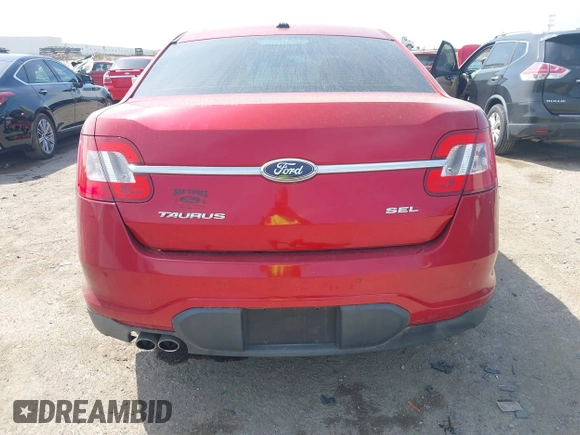 2011 Ford Taurus SEL z VIN 1FAHP2EW7BG123740, wystawiony jako IAAI lot #41890761 z przebiegiem 132 310 mil mil oraz . Historia ofert i sprzedaży dostępna na DreamBid. Obrazek 17.