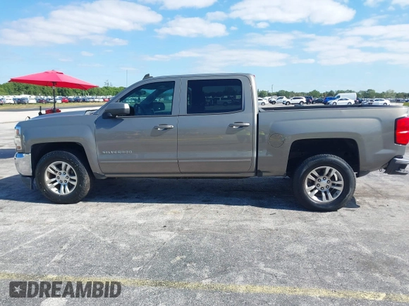 2017 Chevrolet Silverado 1500 LT with VIN 3GCPCREC1HG380406, listed as a IAAI auction lot 42031974 with 128,444 mi miles. Bid and sale history available at carsss.com. Image 14.