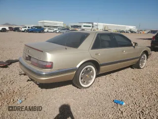 1996 Cadillac Seville Luxury SLS z VIN 1G6KS52Y9TU831614, wystawiony jako Copart lot #73215144 z przebiegiem 119 461 mil mil oraz Czysty tytuł • Clean title. Historia ofert i sprzedaży dostępna na DreamBid. Obrazek 3.