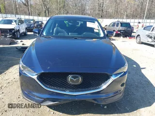 2018 Mazda CX-5 Grand Touring with VIN JM3KFADM1J0322049, listed as a IAAI auction lot 41891079 with 174,939 mi miles and . Bid and sale history available at DreamBid. Image 12.