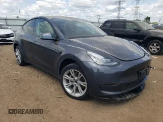 2022 Tesla Model Y Long Range with VIN 7SAYGDEE3NA007737, listed as a Copart auction lot 64602984 with 42,597 mi miles and Salvage Title. Bid and sale history available at carsss.com. Image 4.
