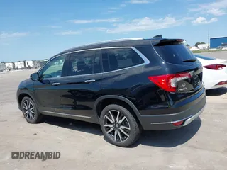 2019 Honda Pilot Touring 7-Passenger with VIN 5FNYF6H67KB031988, listed as a IAAI auction lot 42519588 with 41,368 mi miles and . Bid and sale history available at DreamBid. Image 14.