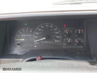 1997 Chevrolet Tahoe with VIN 1GNEK13R4VJ361515, listed as a IAAI auction lot 41768386 with 216,974 mi miles. Bid and sale history available at carsss.com. Image 7.