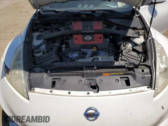2011 Nissan 370Z Touring z VIN JN1AZ4EH7BM551606, wystawiony jako Copart lot #57173945 z przebiegiem Nie podano mil oraz Szkoda całkowita • Salvage title. Historia ofert i sprzedaży dostępna na DreamBid. Obrazek 11.