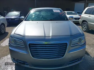 2013 Chrysler 300 C with VIN 2C3CCAEG7DH727559, listed as a IAAI auction lot 41990806 with 201,182 mi miles and . Bid and sale history available at DreamBid. Image 12.