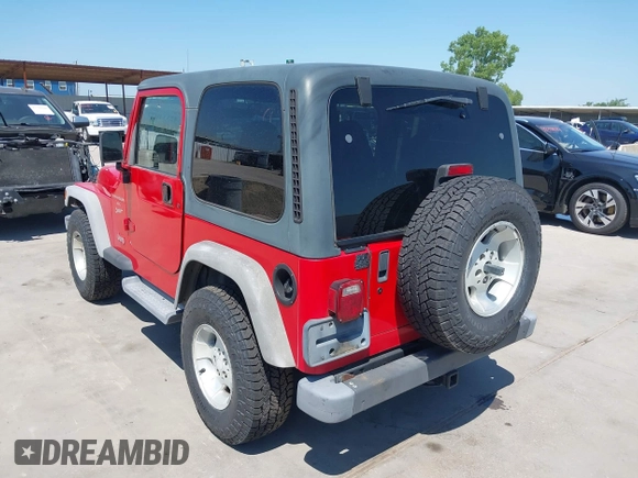 2001 Jeep Wrangler Sport with VIN 1J4FA49S11P375854, listed as a IAAI auction lot 42334037 with 215,027 mi miles and . Bid and sale history available at DreamBid. Image 3.
