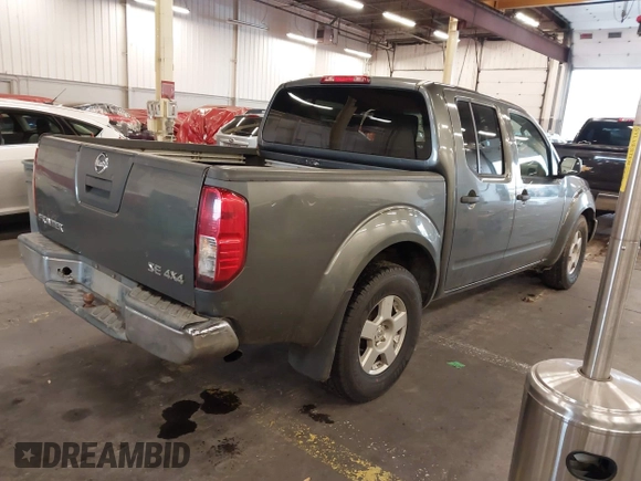 2005 Nissan Frontier LE with VIN 1N6AD07W95C451921, listed as a IAAI auction lot 40952064 with 234,900 mi miles and . Bid and sale history available at DreamBid. Image 4.