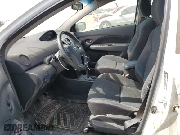 2012 Toyota Yaris with VIN JTDBT4K34CL020771, listed as a Copart auction lot 46887395 with 87,648 mi miles and Clean Title. Bid and sale history available at DreamBid. Image 7.