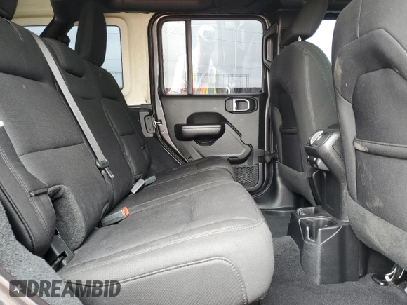 2019 Jeep Wrangler Unlimited Sport S with VIN 1C4HJXDG5KW535115, listed as a Copart auction lot 58404545 with 95,491 mi miles and Salvage title. Bid and sale history available at DreamBid. Image 11.