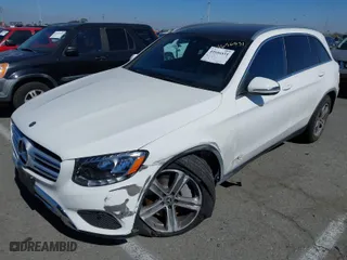 2018 Mercedes-Benz GLC with VIN WDC0G4JB1JV054358, listed as a IAAI auction lot 41656531 with 74,992 mi miles. Bid and sale history available at carsss.com. Image 2.