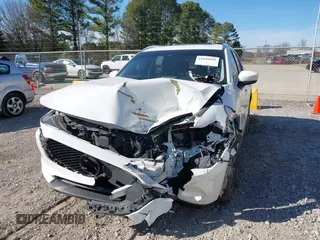 2018 Mazda CX-5 Grand Touring with VIN JM3KFADM0J0377026, listed as a IAAI auction lot 41649686 with 100,901 mi miles and . Bid and sale history available at DreamBid. Image 6.