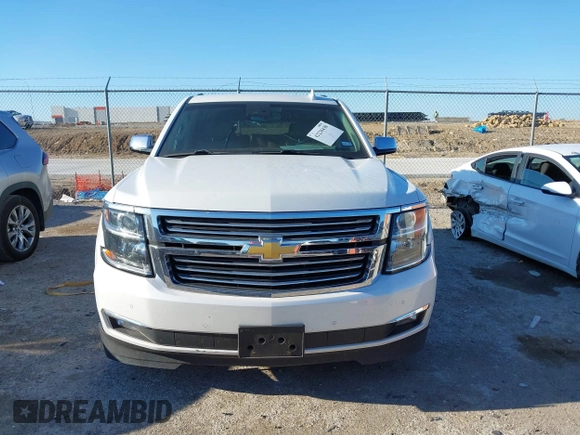 2016 Chevrolet Tahoe LTZ with VIN 1GNSKCKC0GR203348, listed as a IAAI auction lot 42220438 with 108,657 mi miles and . Bid and sale history available at DreamBid. Image 12.