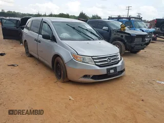 2013 Honda Odyssey LX with VIN 5FNRL5H27DB075559, listed as a IAAI auction lot 42007141 with Not Provided miles and . Bid and sale history available at carsss.com. Image 1.